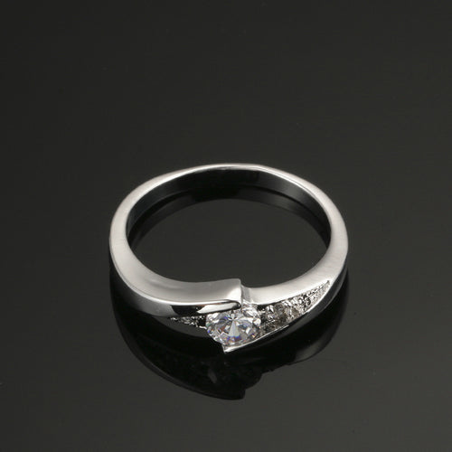 European and American popular best-selling ornaments AAA zircon plating white gold hand ornament fashion brief Engagement Wedding Ring wholesale