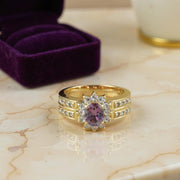 18K yellow gold ring with Peruvian-style etchings and purple gemstone centerpiece, size 8.5