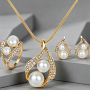 Three-piece Set Of Earrings Necklaces  Rings  And Pearls