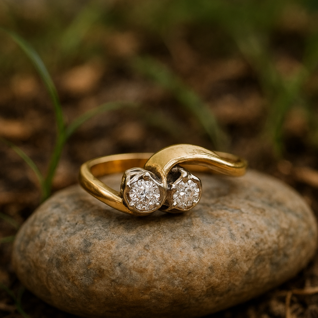18k yellow gold ring features 2 white stones and is a size 7.5